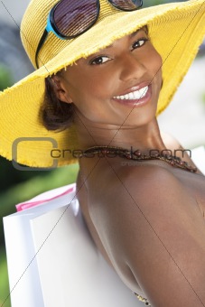 Beautiful African American Woman Smiling With Shopping Bags
