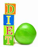 green apple and cubes with letters - diet  