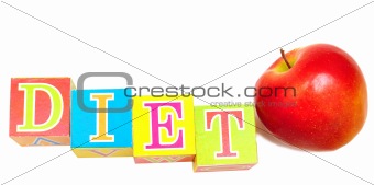 red apple and cubes with letters - diet