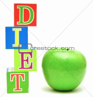 green apple and cubes with letters - diet