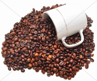 coffee beans falling from a coffee cup