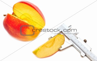 slice of red apple is measured