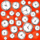 Clocks over red background