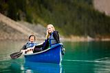 Couple Canoeing and Relaxing