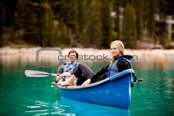 Couple Relaxing in a Canoe