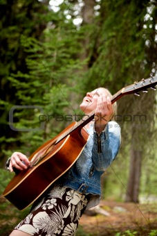 Woman Singing Free in the Forest