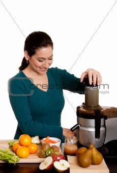 Woman making fruit juice