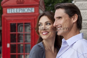 Man & Woman Couple In London With Red Telephone Box