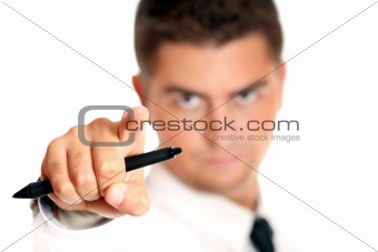 Young businessman pointing at someone