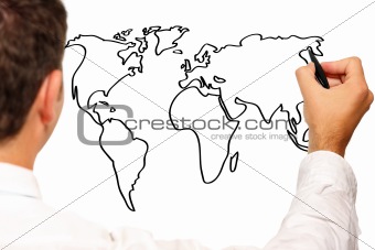 Young businessman drawing a world map