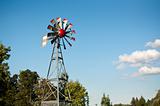 Small Windmill with Blue Sky and Clouds