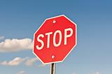 Stop Sign with Blue Sky and Clouds