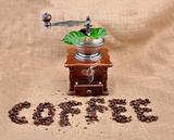 vintage coffee grinder and sign coffe from coffee granules