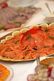 Fresh salmon, served with pepper and lemon Appet