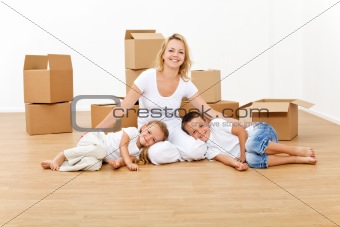 Woman with kids in their new big home