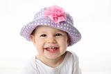 Happy baby wearing hat