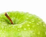 Green apple with waterdrops