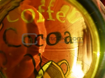 Coffee cup seen through glass