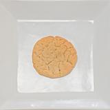 round cookie on square plate