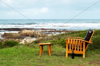 Wooden chair by the ocean