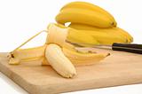 Bananas on a carving board