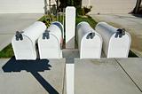 Row of White Mailboxes