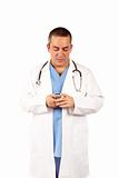 Male doctor sending sms
