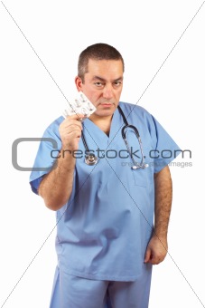 Doctor holding a pills