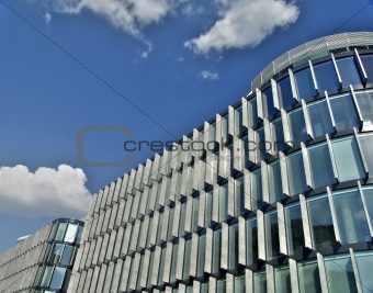 Offices building under cloudy sky