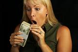 Attractive Woman Holding Stack of Money.