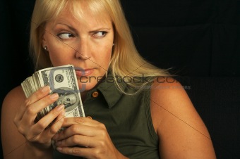 Attractive Woman Holding Stack of Money.