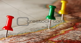 Thumbtack in a map