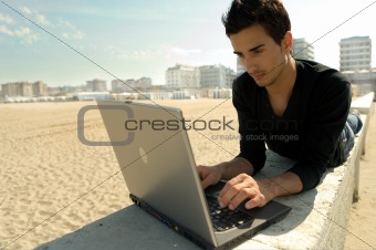 Man working with laptop outdoo