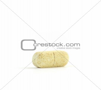 Vitamin C Tablet Against a Pure White Background
