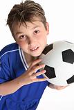 Boy holding a soccer ball