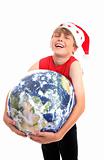 Christmas boy hugging planet earth