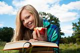 student girl with apple and books