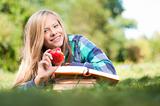 student girl with apple and books