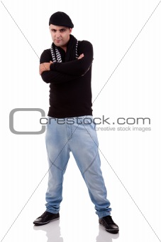 Portrait of a young man serious, with arms crossed, in autumn/winter clothes, isolated on white. Studio shot