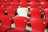 Red Tribune Seats in a stadium - detail view