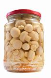 Marinaded mushrooms in a glass jar