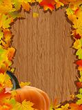 Autumn background with Pumpkin on wooden board.