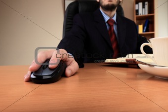 Businessman at office working at his workplace.