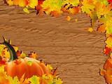 Autumn background with Pumpkin on wooden board.