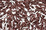 Background of brown and white sprinkles
