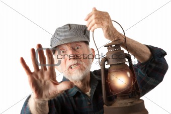 Railroad man holding lantern
