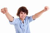 Portrait of a very happy  young man with his arms raised, on white background. Studio shot
