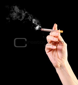  woman hand holding a cigarette with smoke
