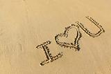 "I love you" drawing on the beach