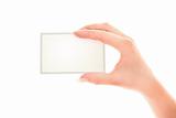Hand with blank card isolated on white